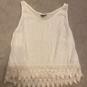 Tank top with frill at end.